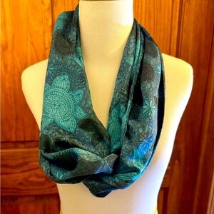 Women’s handmade silky print infinity scarf. 
Pre-owned. Teal colors